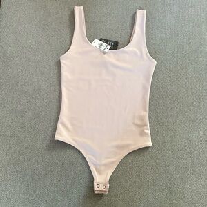 Express Body Contour Bodysuit in Pale Pink NWT